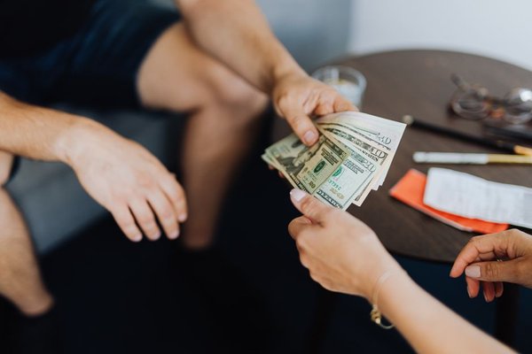 who pays debt in a divorce